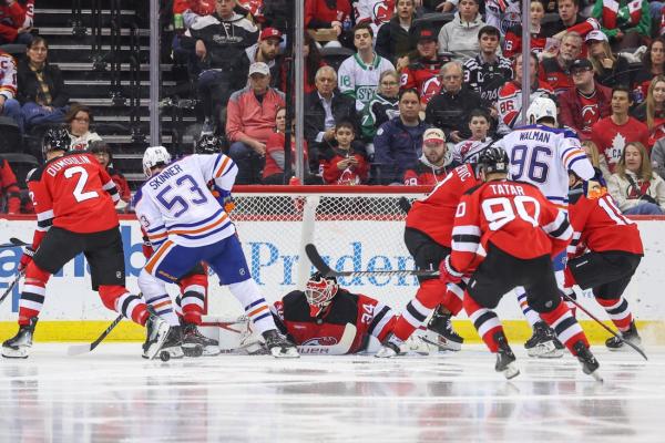 Third-period surge lifts Devils over sliding Oilers