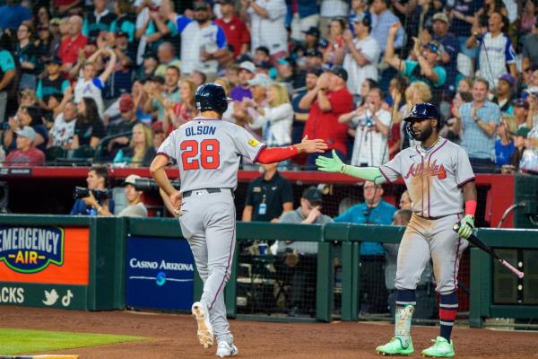 Braves beat D-backs in 10 despite 4 HRs by Eugenio Suarez