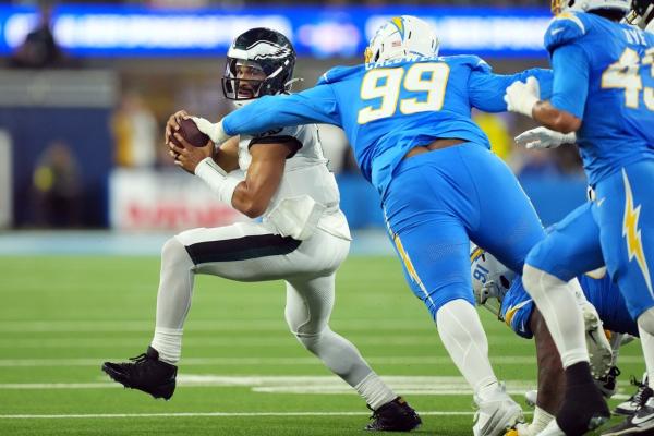 Chargers survive turnover festival to down Eagles in OT