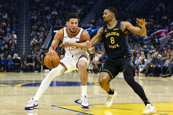 Warriors build cushion in 4th, then fend off pesky Suns