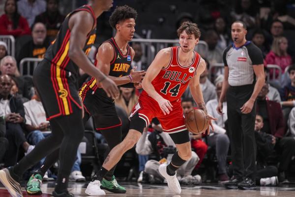 Bulls fend off Hawks in shootout, 152-150