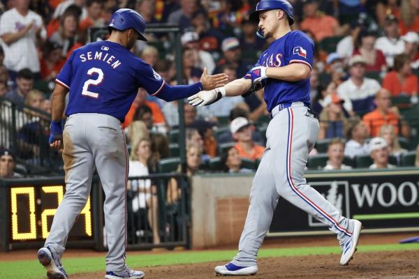 Home runs propel surging Astros past Rangers thumbnail