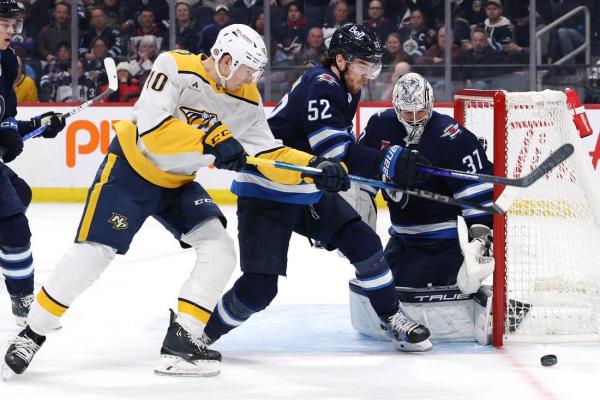 Connor Hellebuyck gets 300th win as Jets defeat Predators