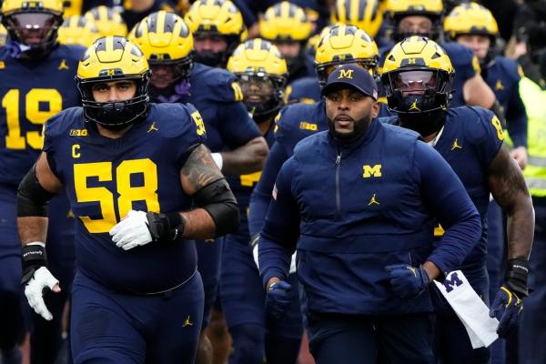 Ex-Michigan coach Sherrone Moore remains in custody