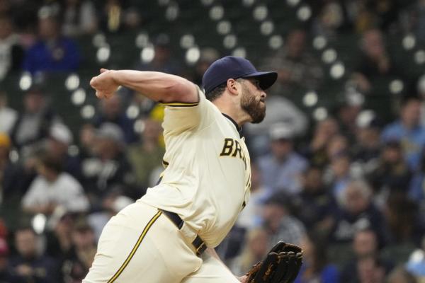 Christian Yelich’s 10th-inning slam lifts Brewers over Red Sox