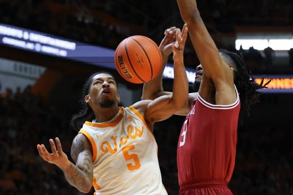 No. 1 Tennessee 14-0 after cruising past No. 23 Arkansas