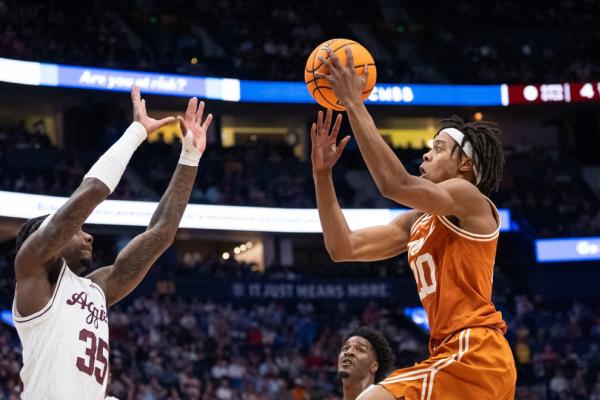 Texas goes two OTs to slip past No. 14 Texas A&M 94-89