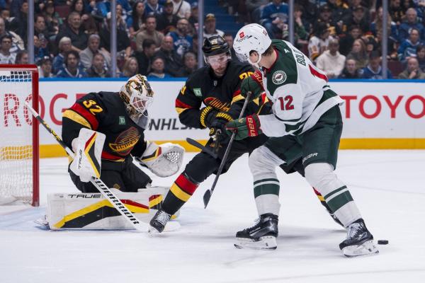 Canucks sink Wild late, sit in second wild-card spot