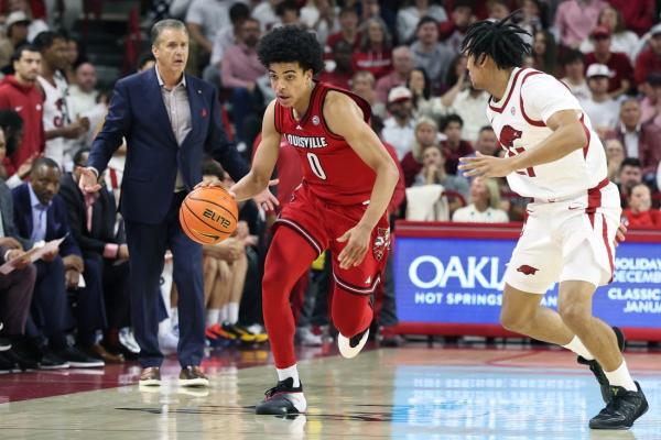 Louisville star freshman Mikel Brown Jr. (back) wonât play at Cal
