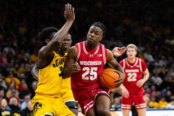 No. 21 Wisconsin uses late surge to down Iowa