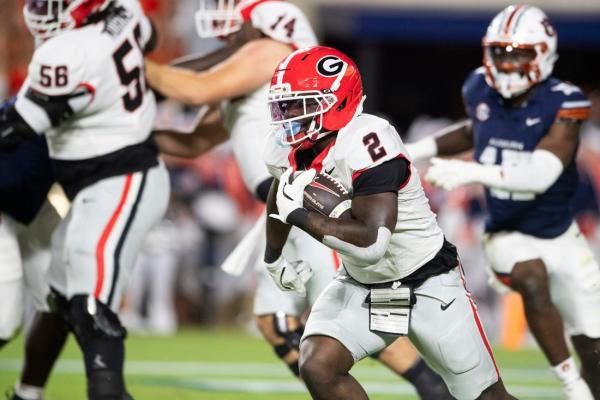 No. 10 Georgia overcomes slow start to beat Auburn for ninth straight time