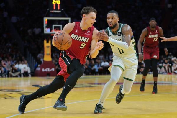 Damian Lillard (37) leads Giannis-less Bucks past Heat