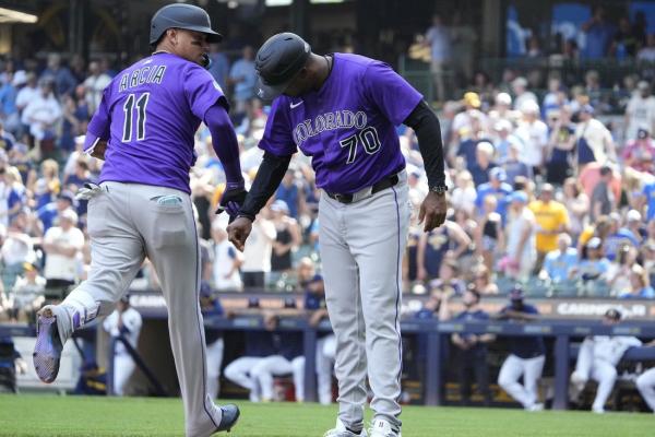 Rockies tie game in ninth, beat Brewers in 11 innings