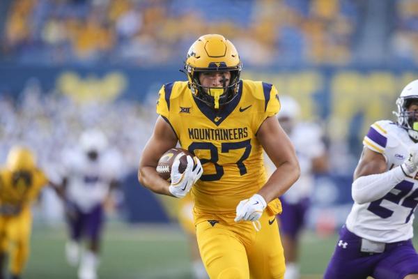 West Virginia rushes for 305 yards, blasts Albany