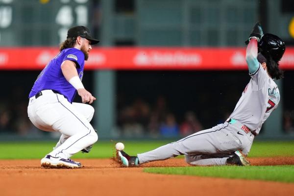 Brenton Doyle scores on error as Rockies rally past D-backs thumbnail