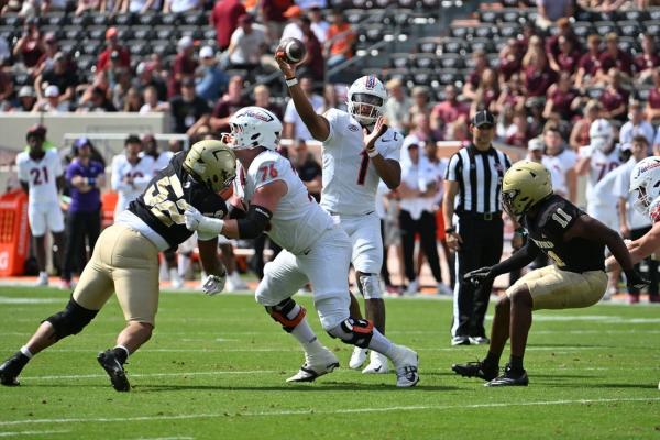 Virginia Tech pounds Wofford in first game since firing coach
