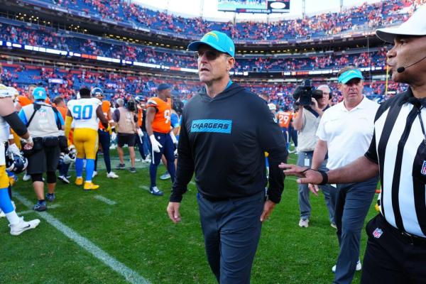 Chargers coach Jim Harbaugh briefly exits game due to arrhythmia