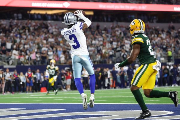 Wild finish results in OT tie for Packers, Cowboys