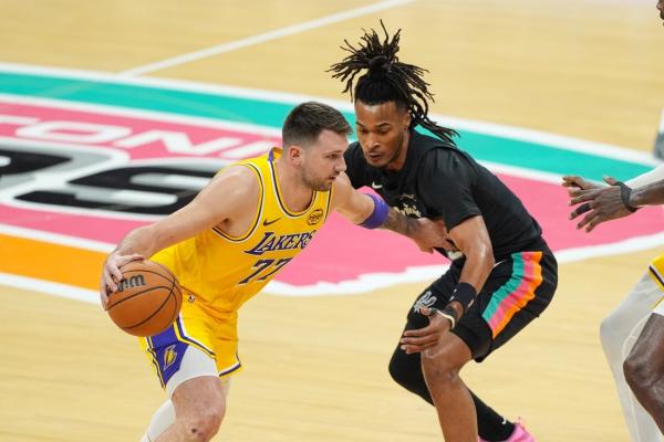 Spursâ balanced attack overcomes Luka Doncicâs individual effort in win over Lakers