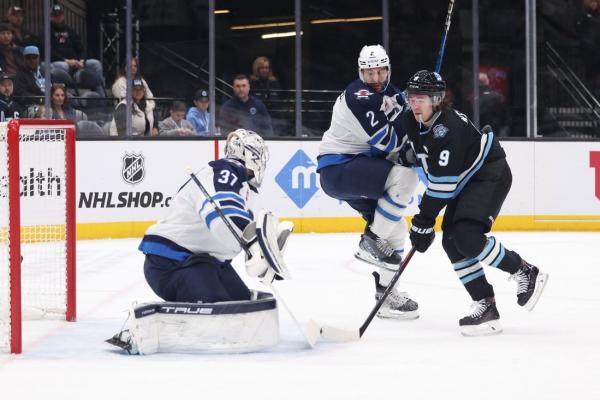 Utah glides past Winnipeg for rare home win