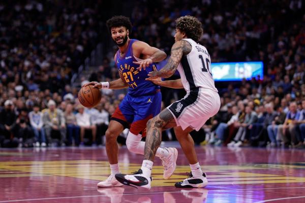 Spurs charge back, down Nuggets to take West Group C