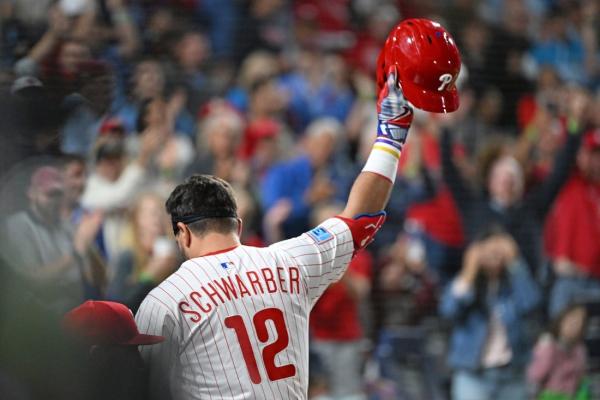 Kyle Schwarber hits 50th HR, Ranger Suarez fans 12 as Phils top Mets