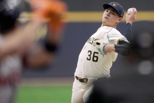 Brewers muscle past Astros to open three-game set