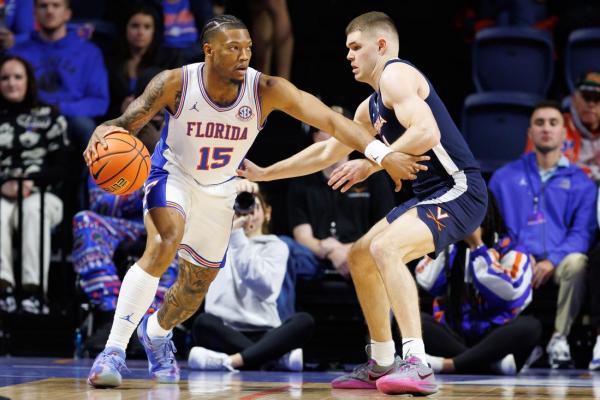 No. 13 Florida cruises past Virginia for 9-0 start