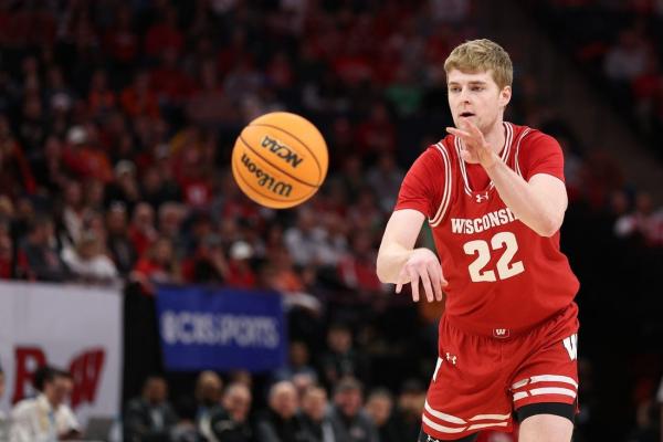 Wisconsin looking inside to replace top production, opens with Holy Cross