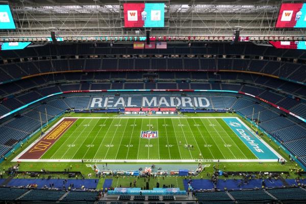 Dolphins go overtime to knock off Commanders in Spain