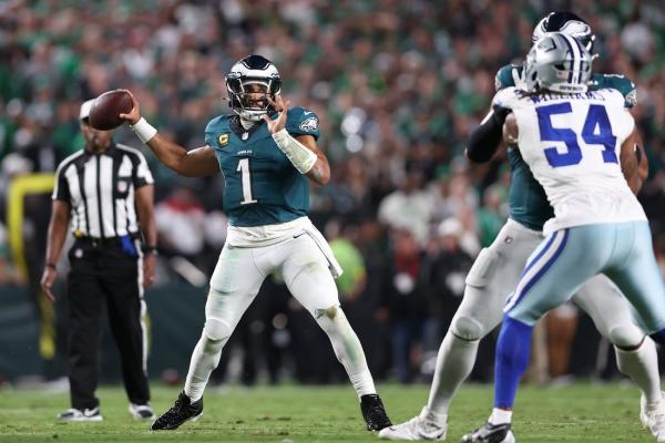Cowboys-Eagles season opener halted by lightning delay
