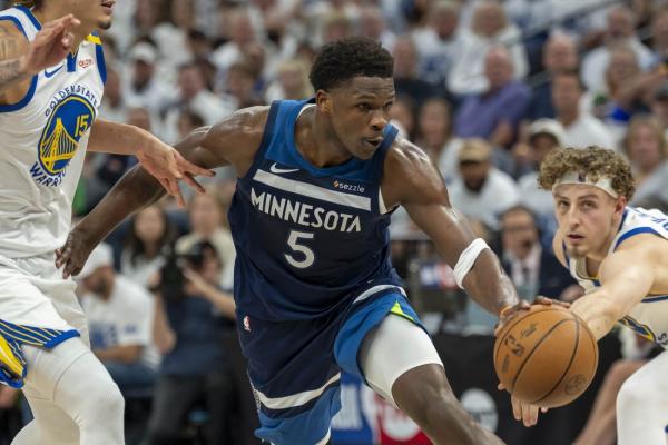 Wolves' Anthony Edwards exits due to ankle injury