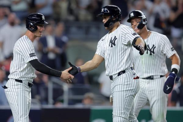 Yankees’ bats erupt after rain delay in 10-3 rout of Mariners