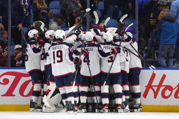 Miles Wood tallies twice late to lift Blue Jackets past Sabres