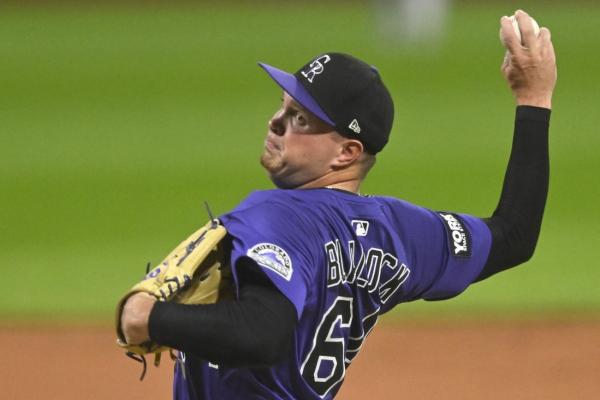 Rockies score 4 runs in 9th to top Guardians