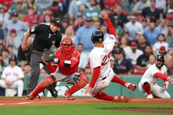 Double-play grounder in 10th lifts Angels past Red Sox
