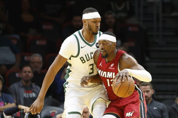Heat hold on for sixth straight win at Bucks’ expense