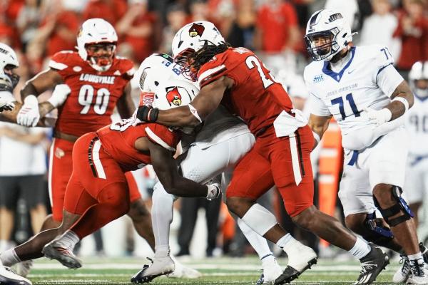 Defense helps Louisville rally for win over James Madison