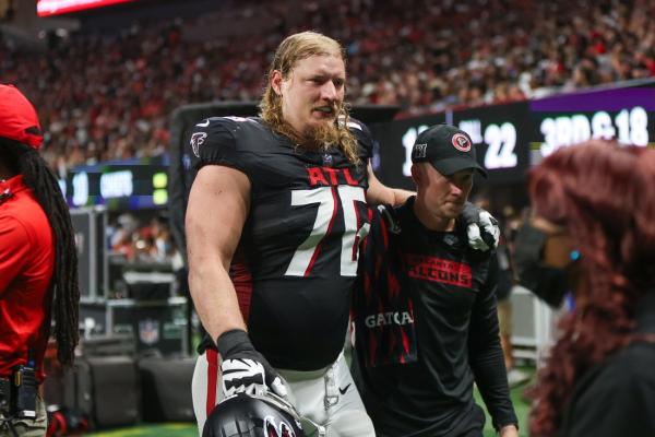 Falcons starting RT Kaleb McGary carted off practice field