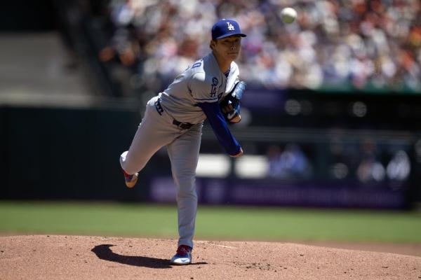 Dodgers’ two-out rally puts away rival Giants in extras