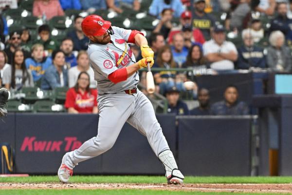 Cards outlast Brewers, win 7-4 in 12 innings