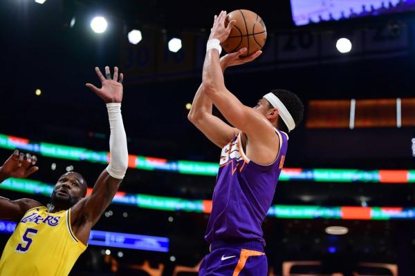 NBA roundup: Devin Booker gets hurt, but Suns end Lakers’ win streak