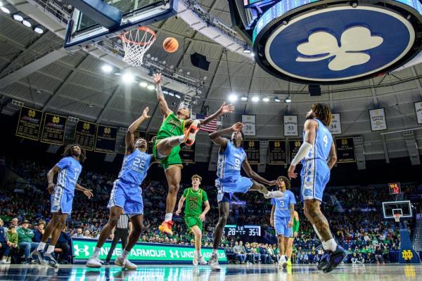 Late four-point play gets North Carolina past Notre Dame