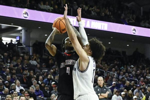 Northwestern rallies from 13 down to beat Northeastern