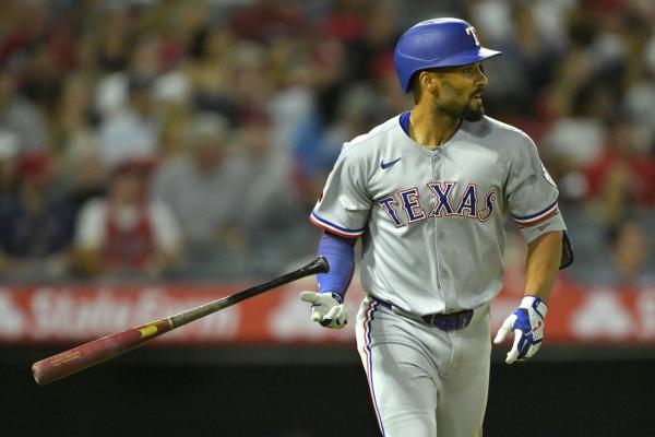 Seven-run inning propels Rangers past Angels