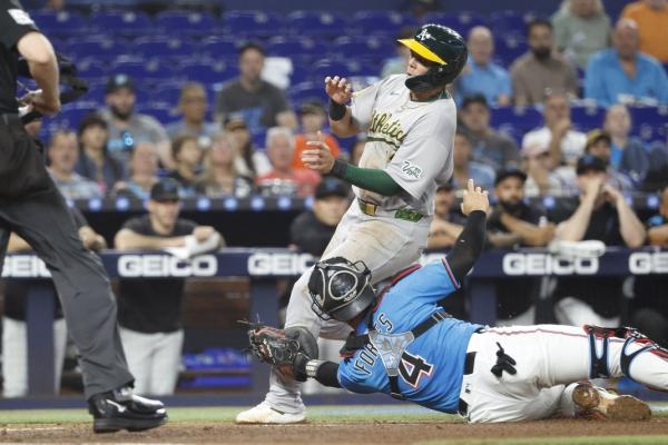 A’s grab lead in ninth, beat Marlins in rubber game