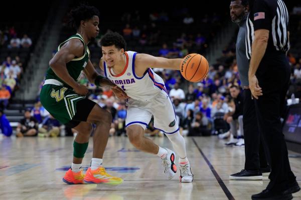 No. 21 Florida makes free throws, sinks USF on emotional night