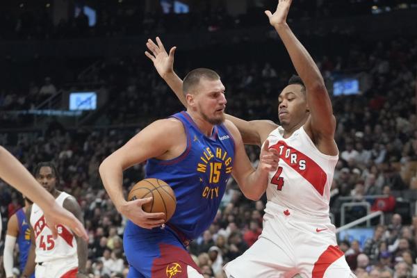 Nikola Jokic scores 40 to carry Nuggets past Raptors in OT thumbnail