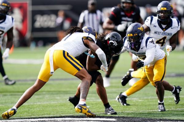 West Virginia takes advantage of turnovers, downs Cincinnati