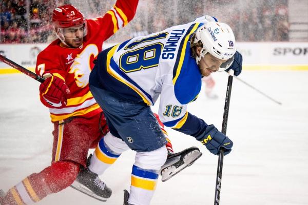 Blues run point streak to 5 with OT win over Flames